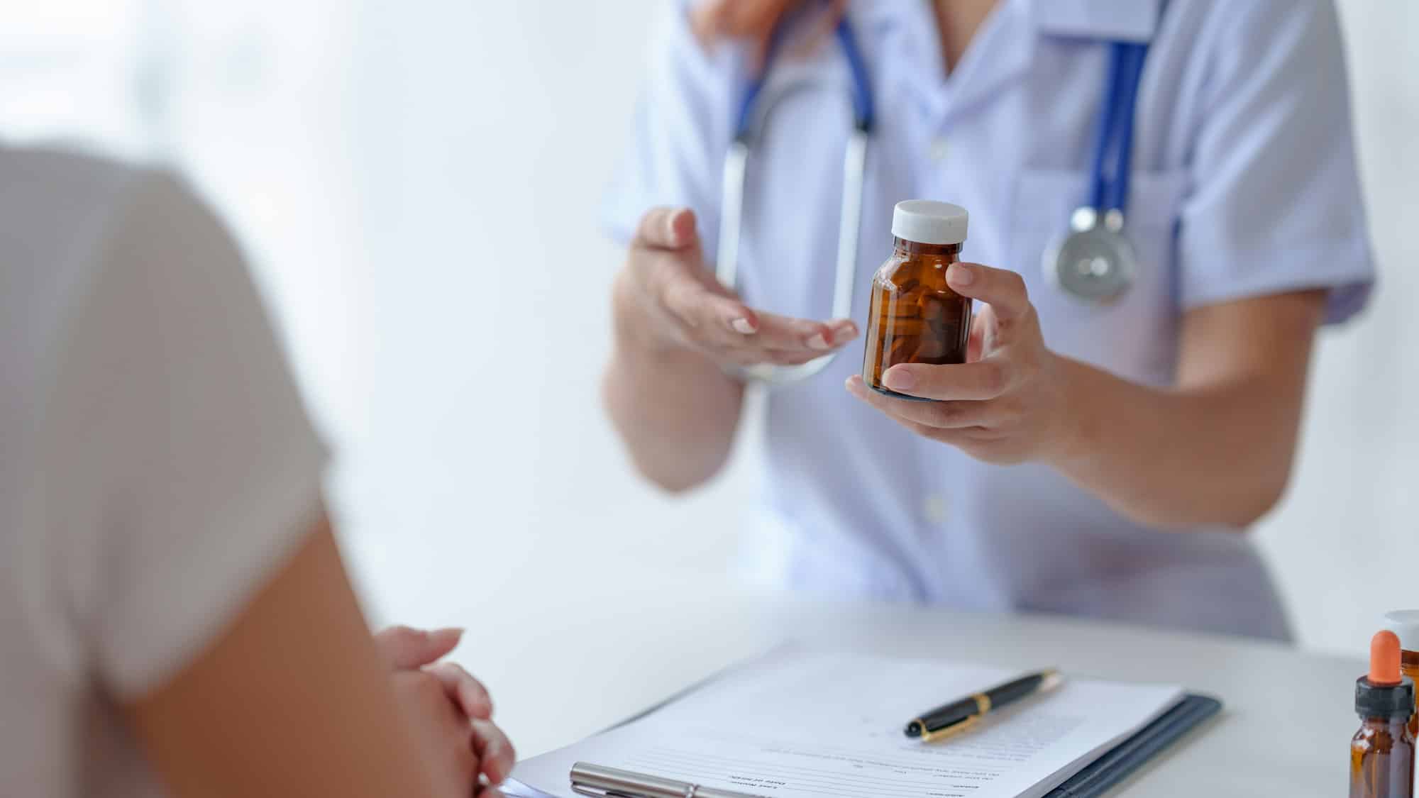 Doctor who records a patient's detailed information or medication history is evaluating medications