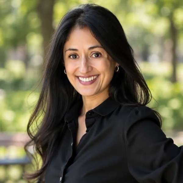 Smiling woman outdoors, representing compassionate psychiatric care at Peak Mental Healthcare.