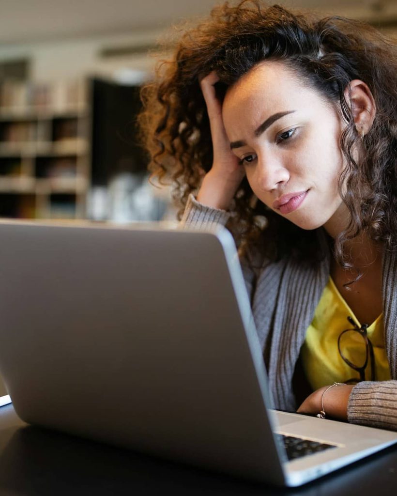 Student woman finding it difficult at study and comprehend scool tasks